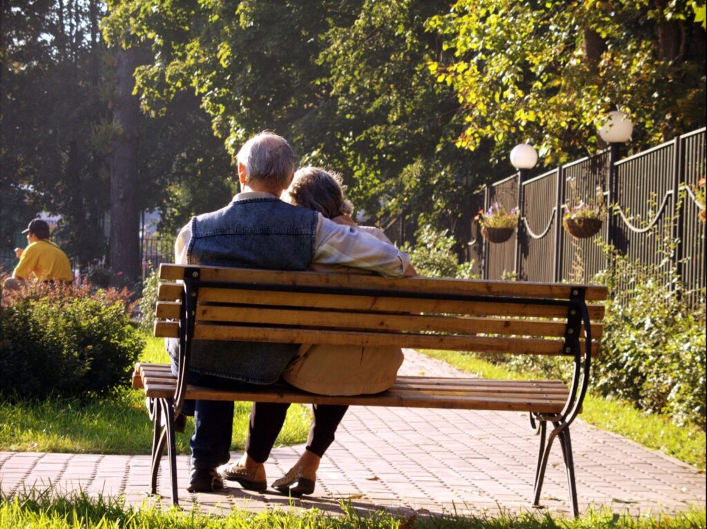 couple sitting on bench