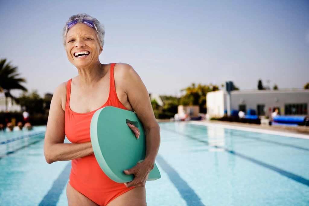 woman standing by pool