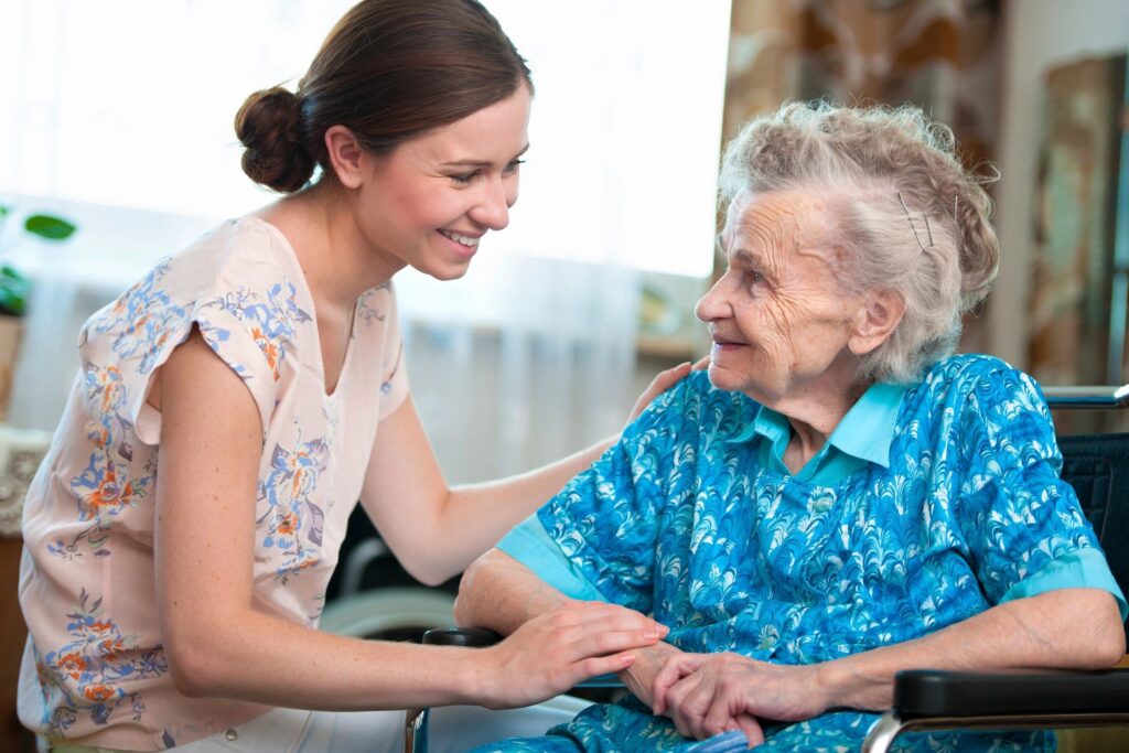 home care worker and old woman