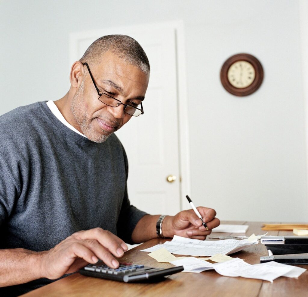 man paying bills