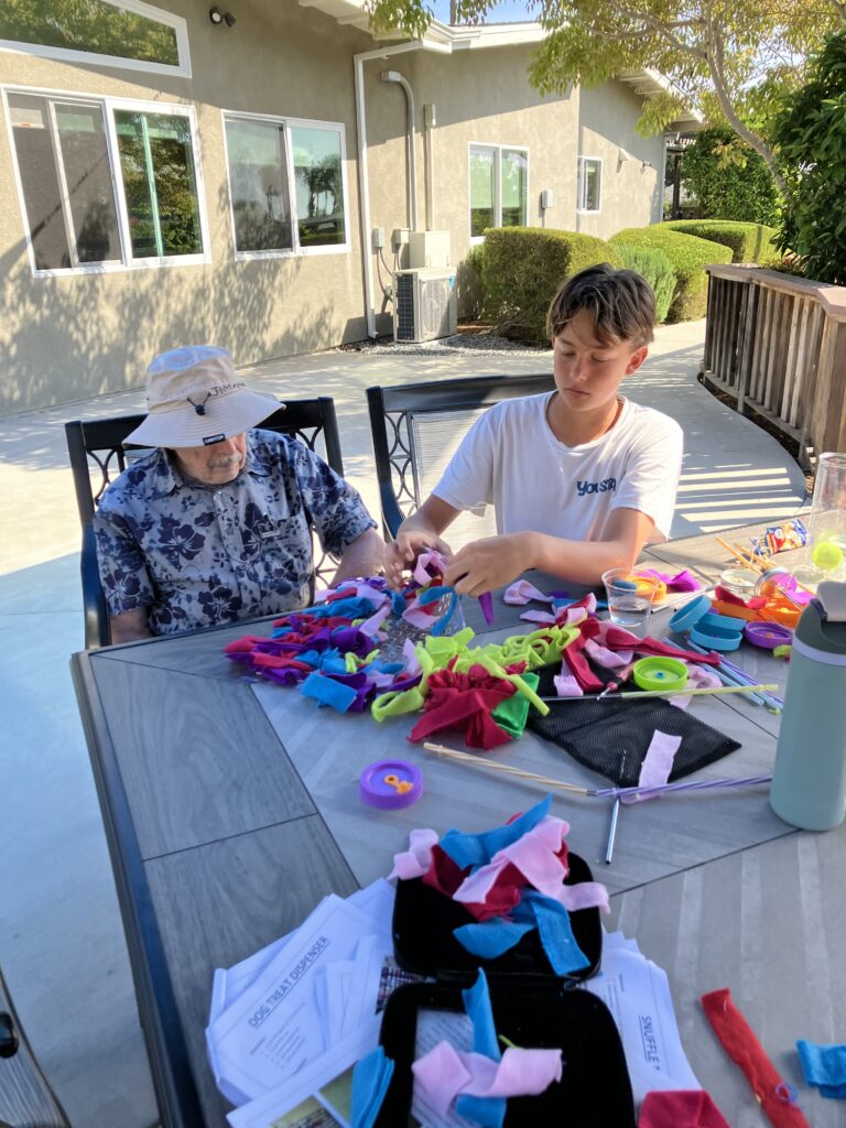 student and senior playing