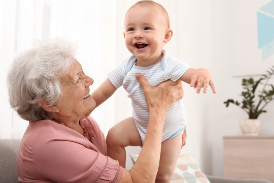 grandma holding baby